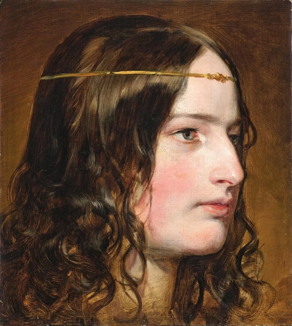 Una giovane ragazza con i capelli scuri e la fascia